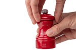 Moulin à poivre manuel Peugeot Bistro en bois de hêtre laqué rouge passion 10cm