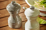 Moulin à poivre manuel Peugeot Bistro en bois de hêtre laqué gris taupe 10cm