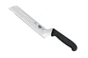 Couteau à beurre/fromage à pâte molle Victorinox lame alvéolée 21cm