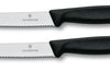2 couteaux de table Victorinox noirs lames crantées 11cm bout rond