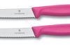 2 couteaux de table Victorinox roses lames crantées 11cm bout rond