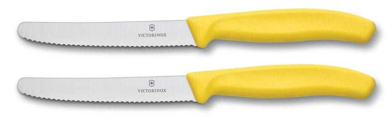 2 couteaux de table Victorinox jaunes lames crantées 11cm bout rond