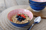 Bol en grès émaillé KitchenCraft motif arc bleu et rouge