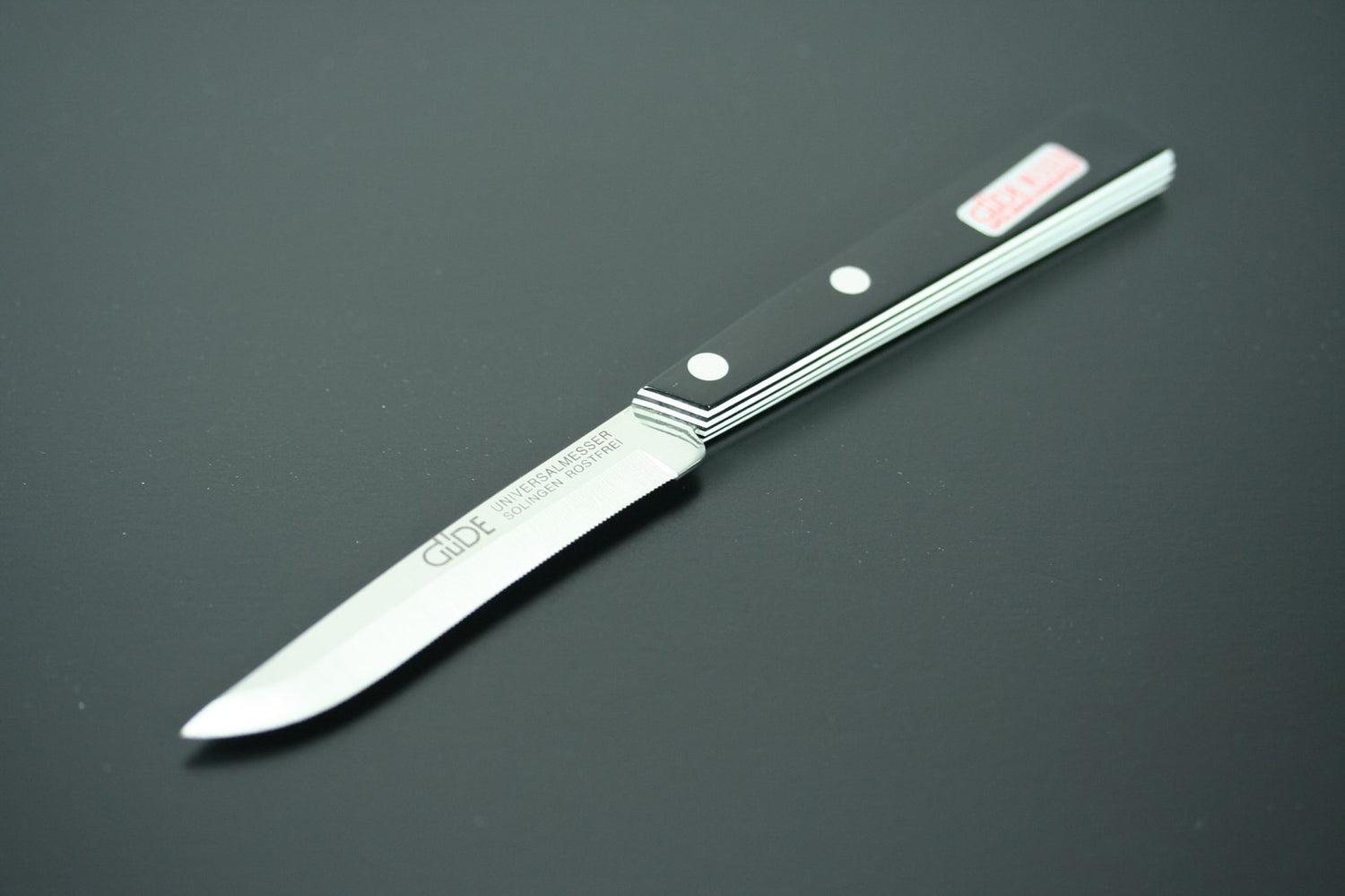 Couteau de table GÜDE Universel 10cm micro-denté manche noir/blanc