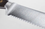 Couteau à pain Wüsthof Crafter forgé 23cm en chêne fumé
