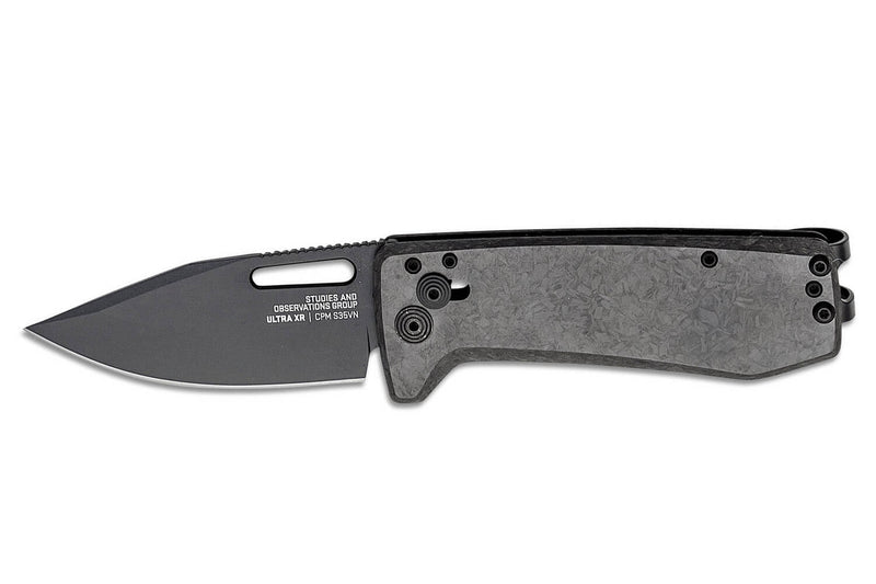 Couteau pliant SOG Ultra XR SGULTRAXRXHPBK manche en fibre de carbone noir 9,1cm