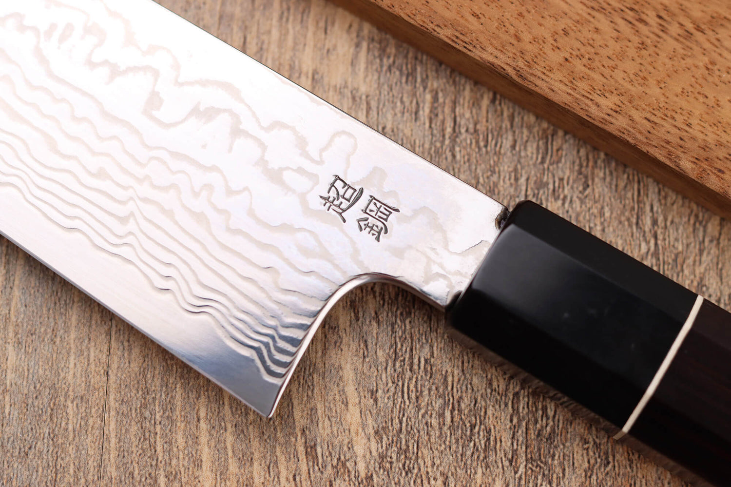 Couteau kiritsuke 21cm japonais artisanal Sukenari ZDP-189 damas manche en ébène